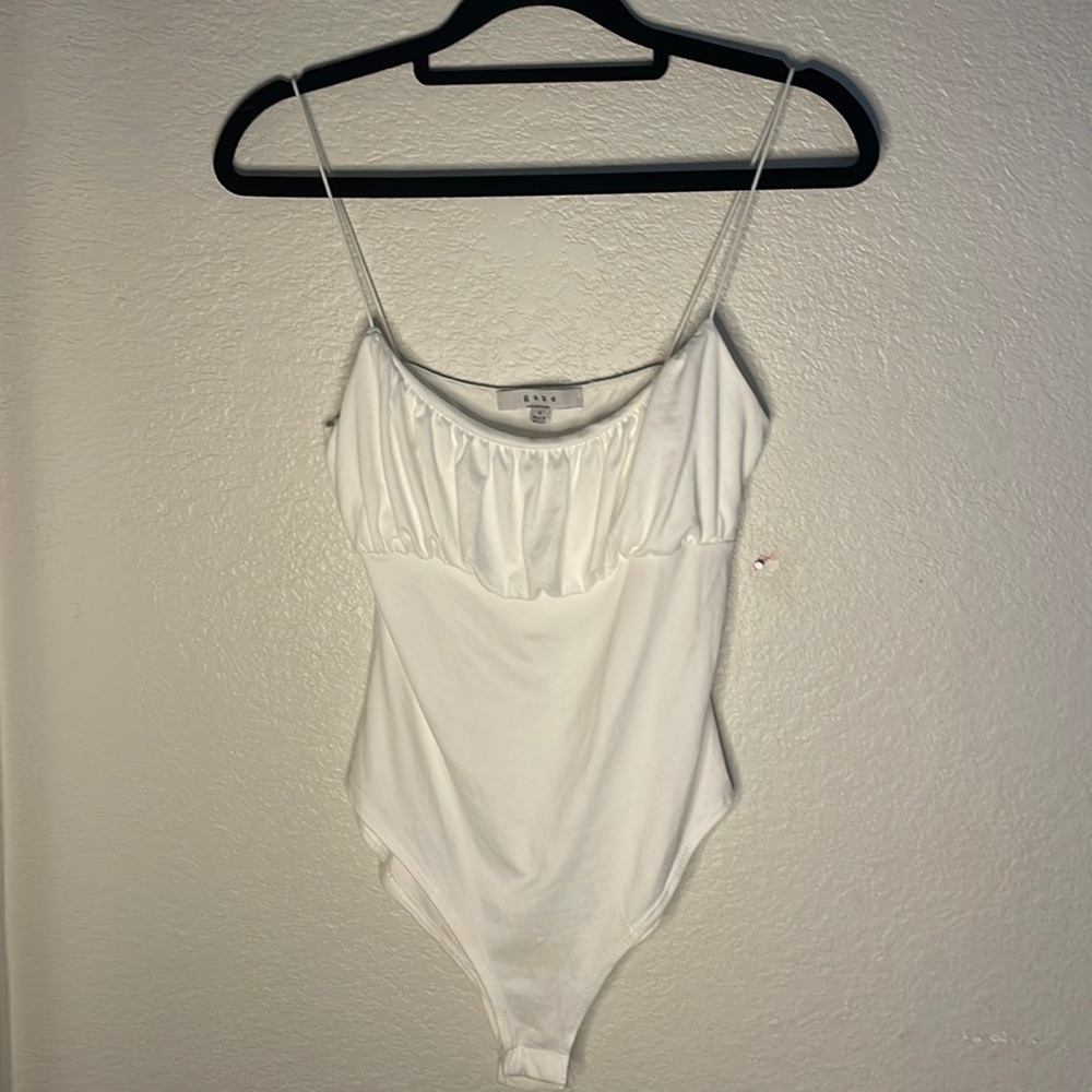 Barely worn white body suit! Brand: Gaze, size small